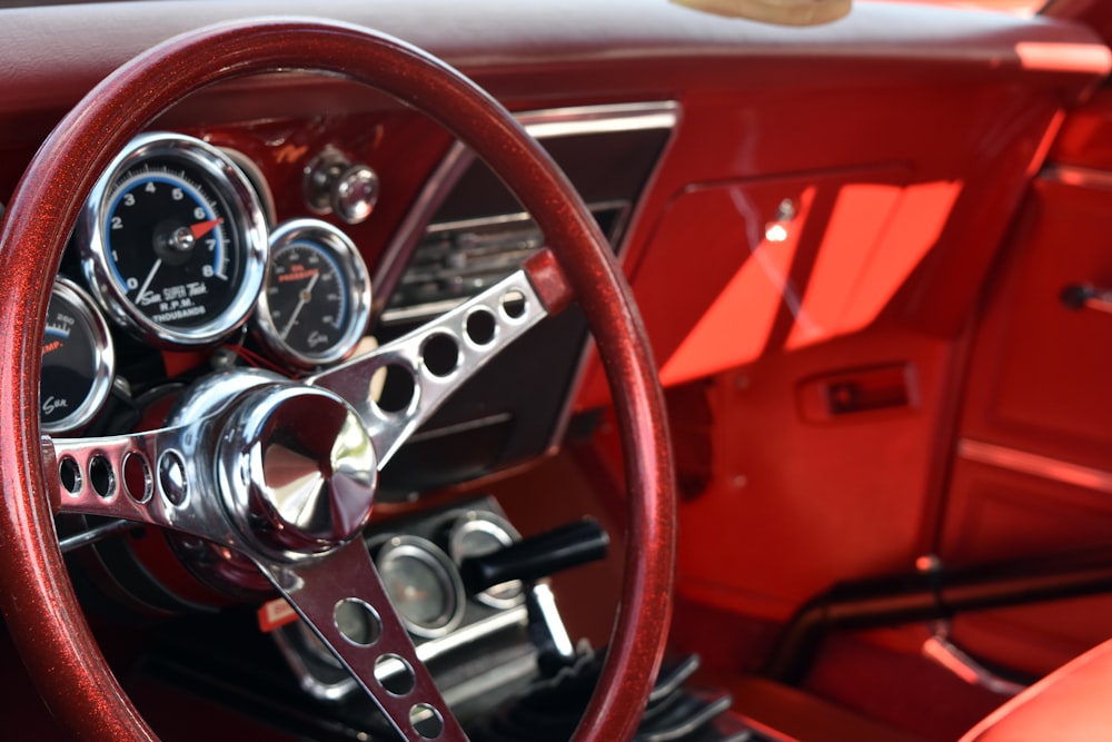 red vehicle steering wheel