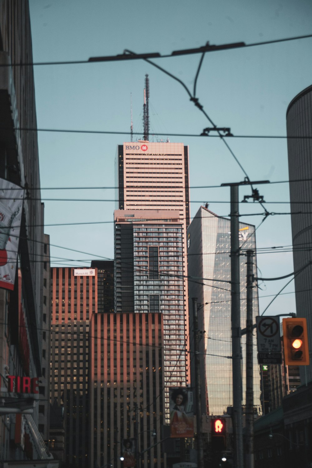 a city with tall buildings and a traffic light