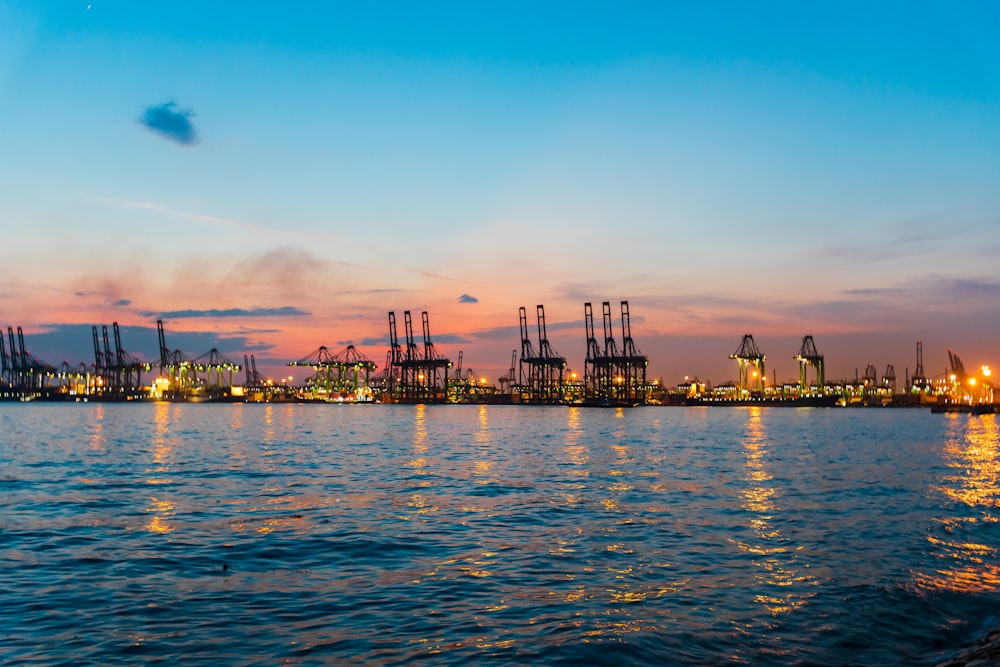 a large body of water with a city in the background