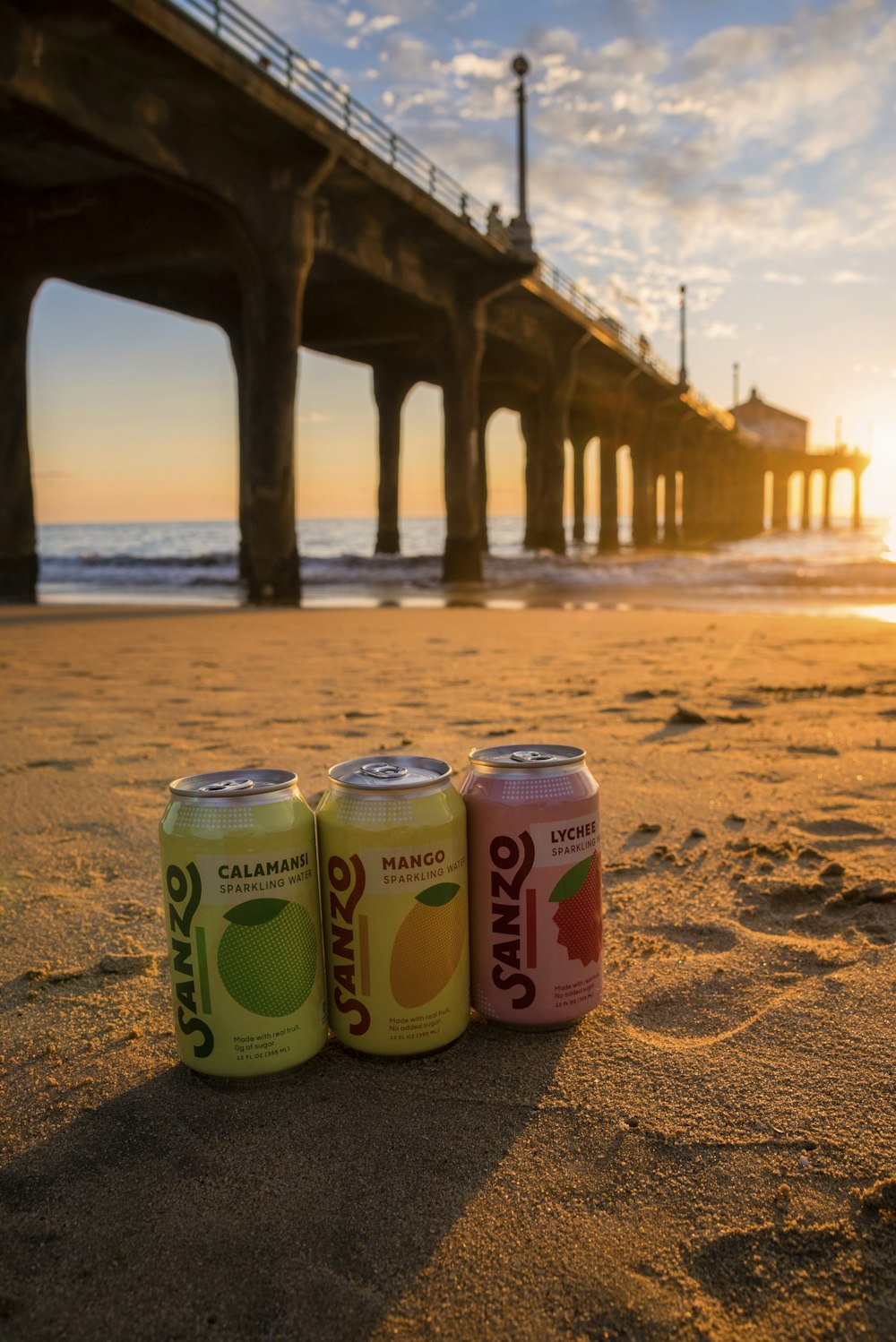 assorted juice cans near shore