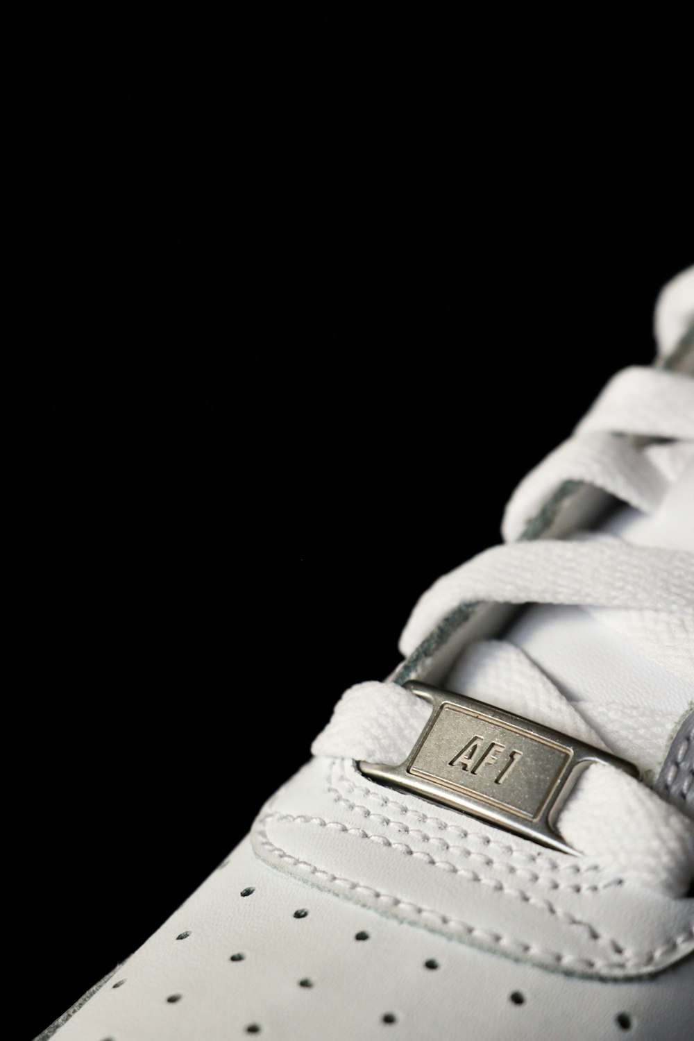 close-up photo of white low-top sneakers