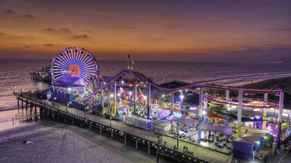 amusement park on dock during golden hour