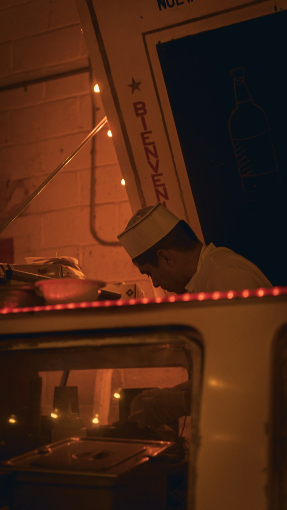 a man in a chef's hat cooking in a kitchen