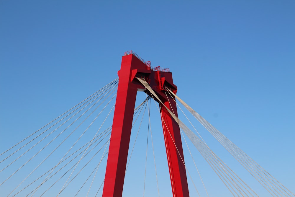 red self-anchored suspension bridge
