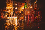 assorted flavor of wine bottles on table