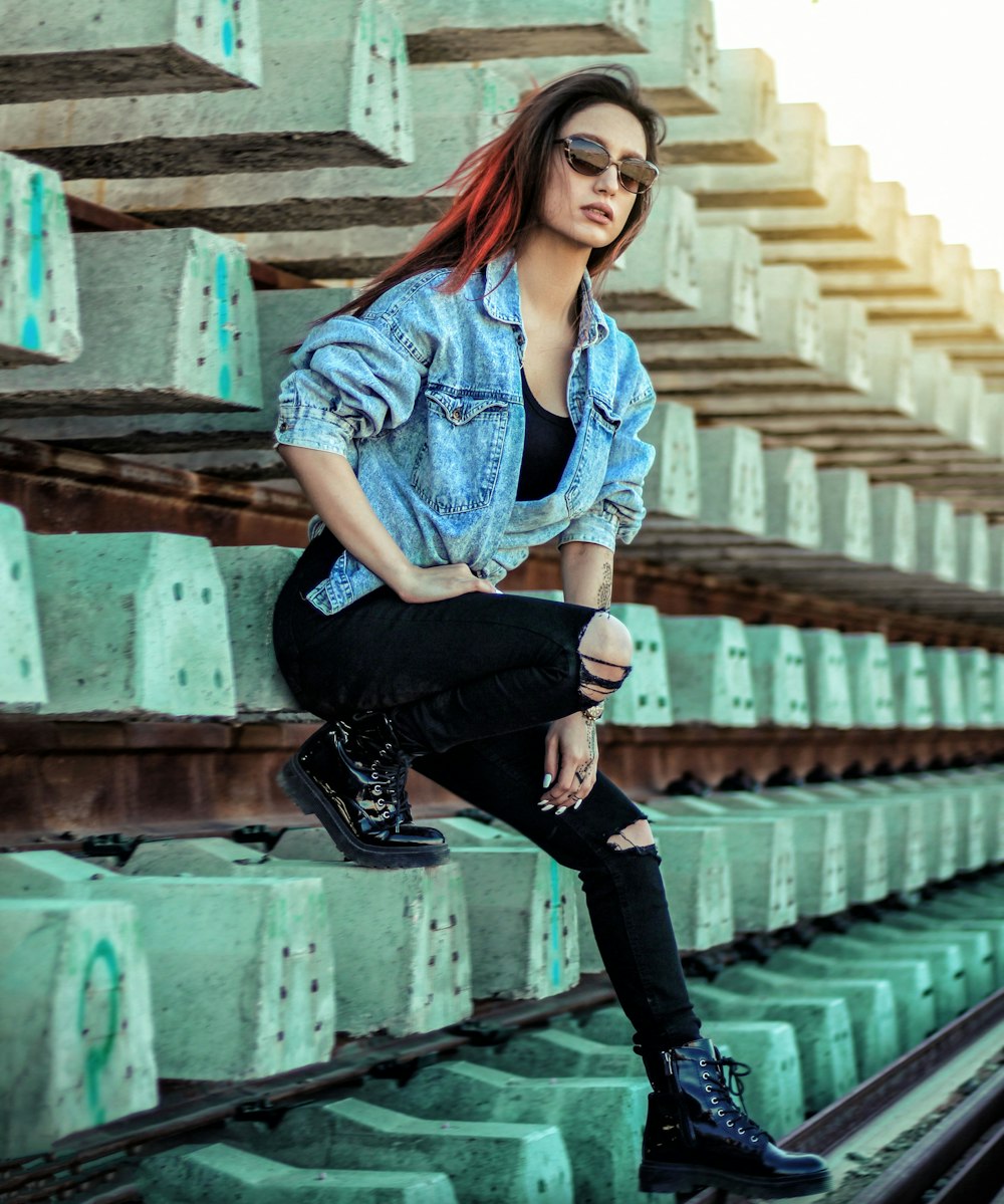 woman wearing blue denim jacket