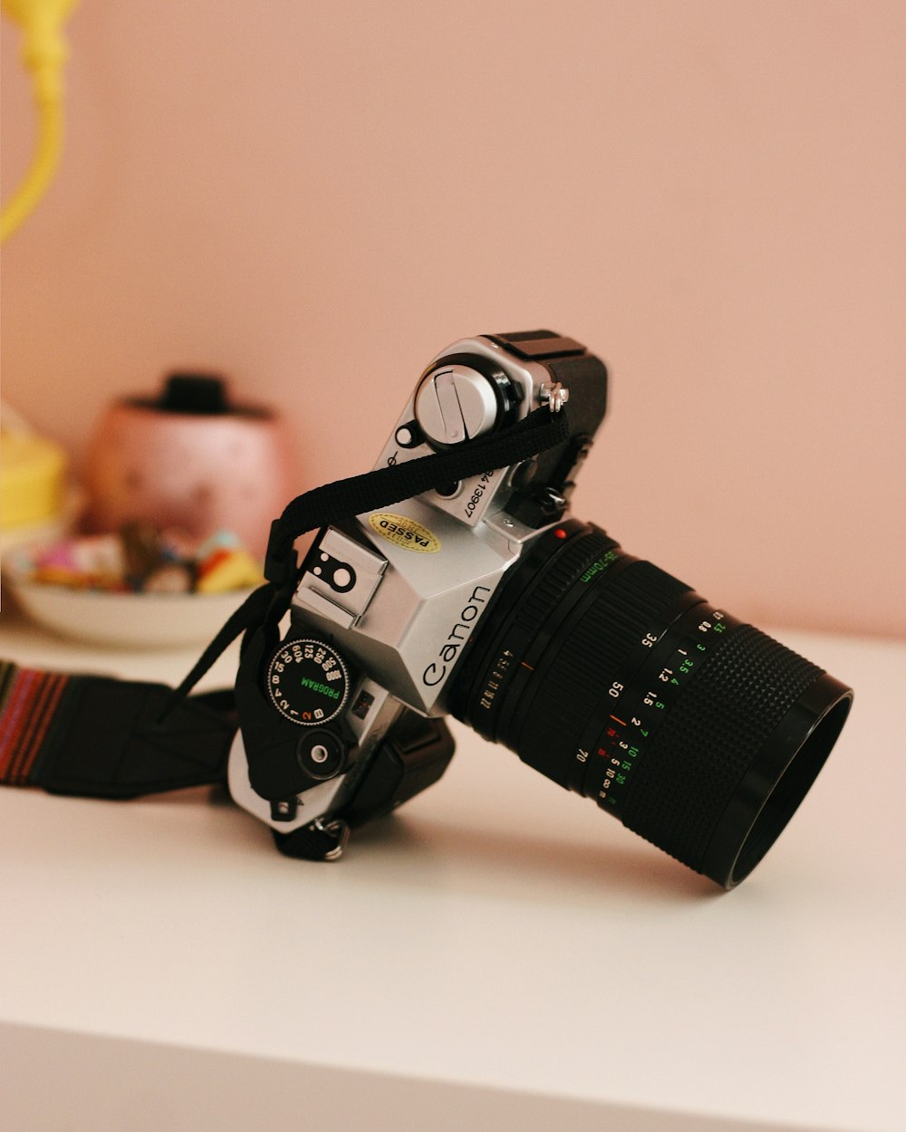 black and silver Canon DSLR camera