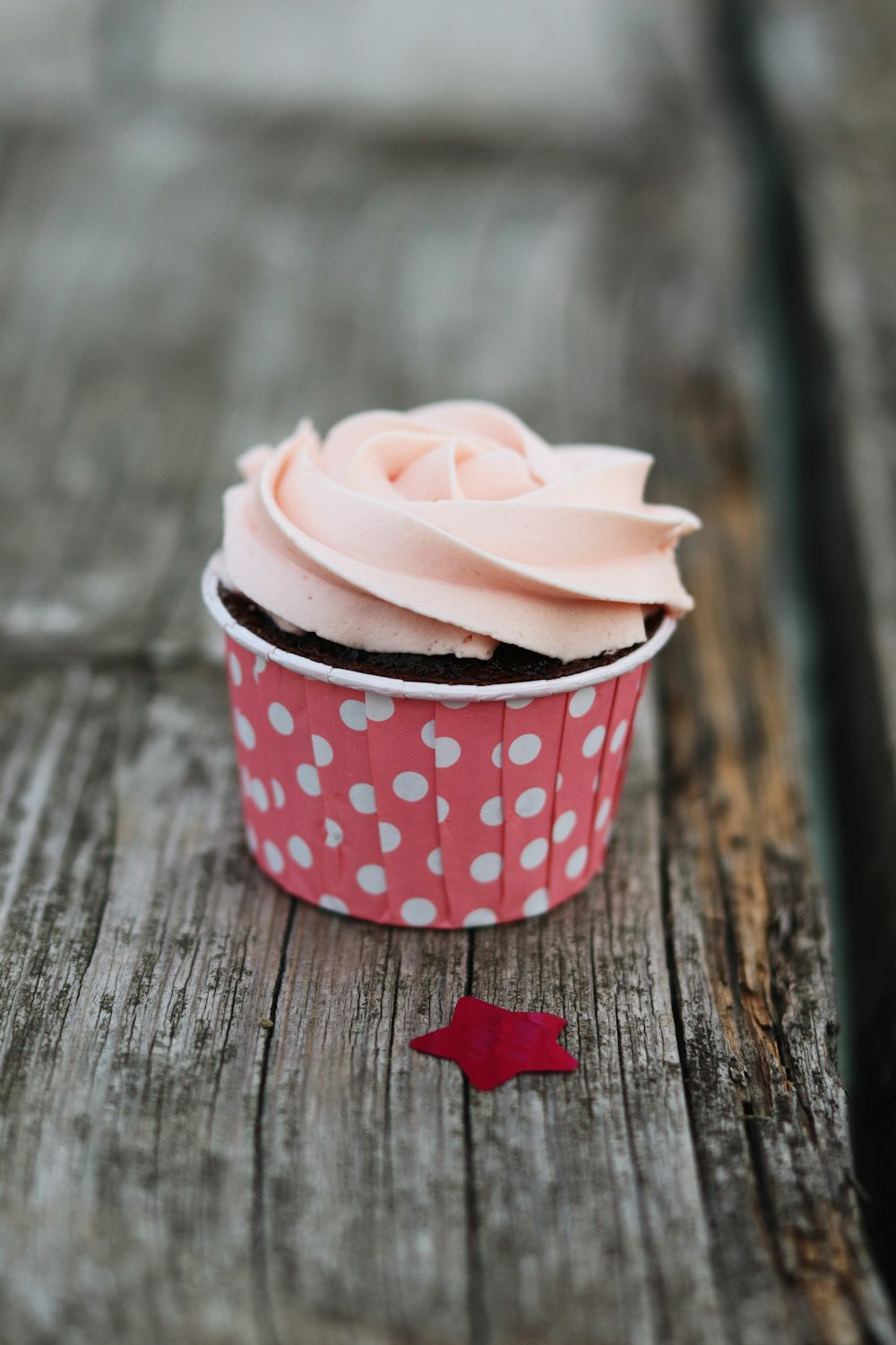 pink and white cup with dessert