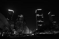 A city skyline with various hotels, representing available hotel listings.