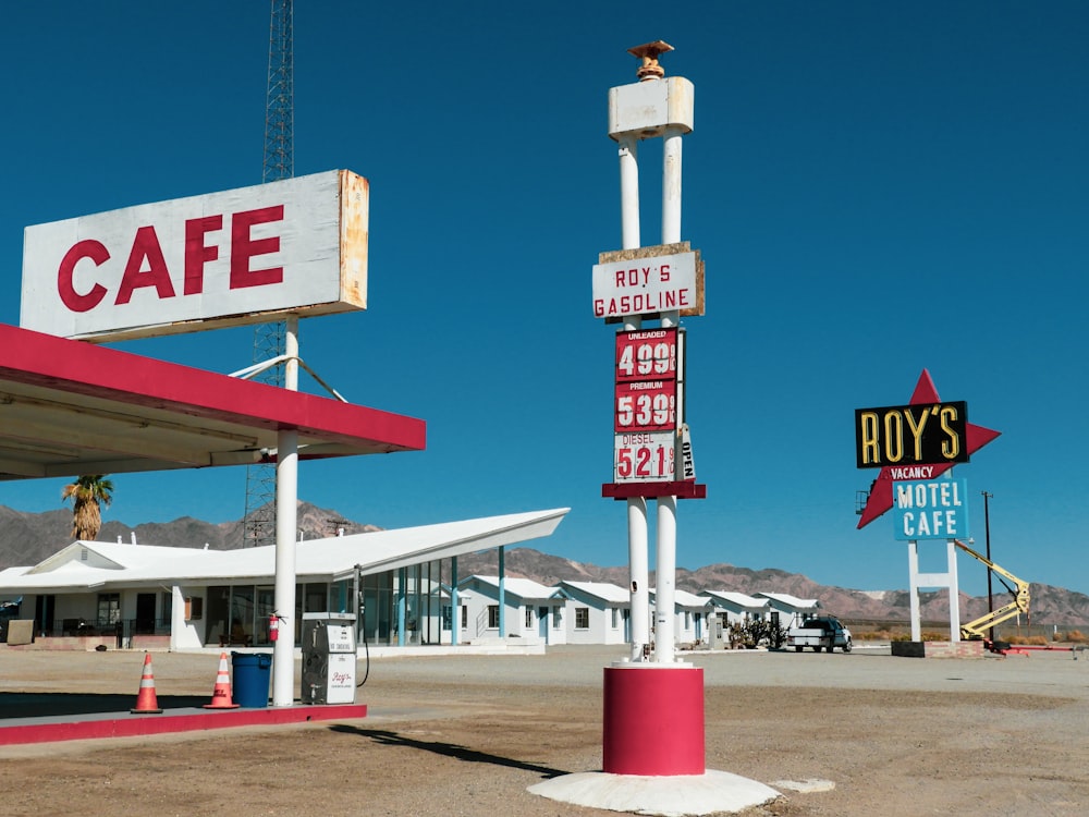 Cafe and gasoline station during daytime