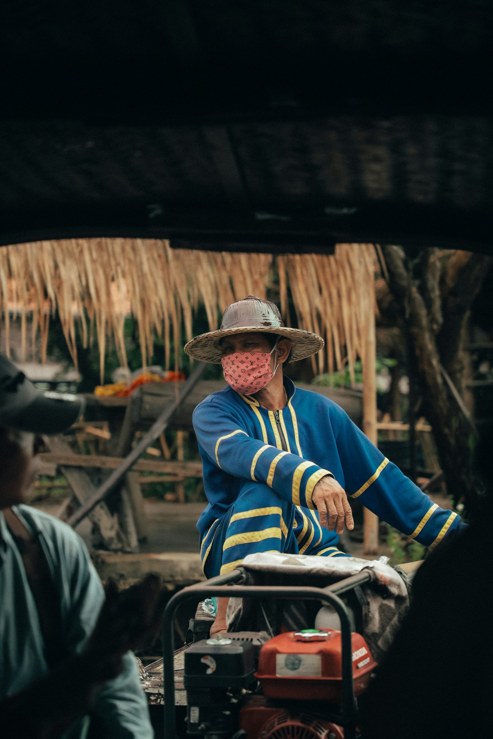 Canon EOS-1D X Mark II + Canon EF 24-105mm F4L IS II USM sample photo. Man sitting on wood photography