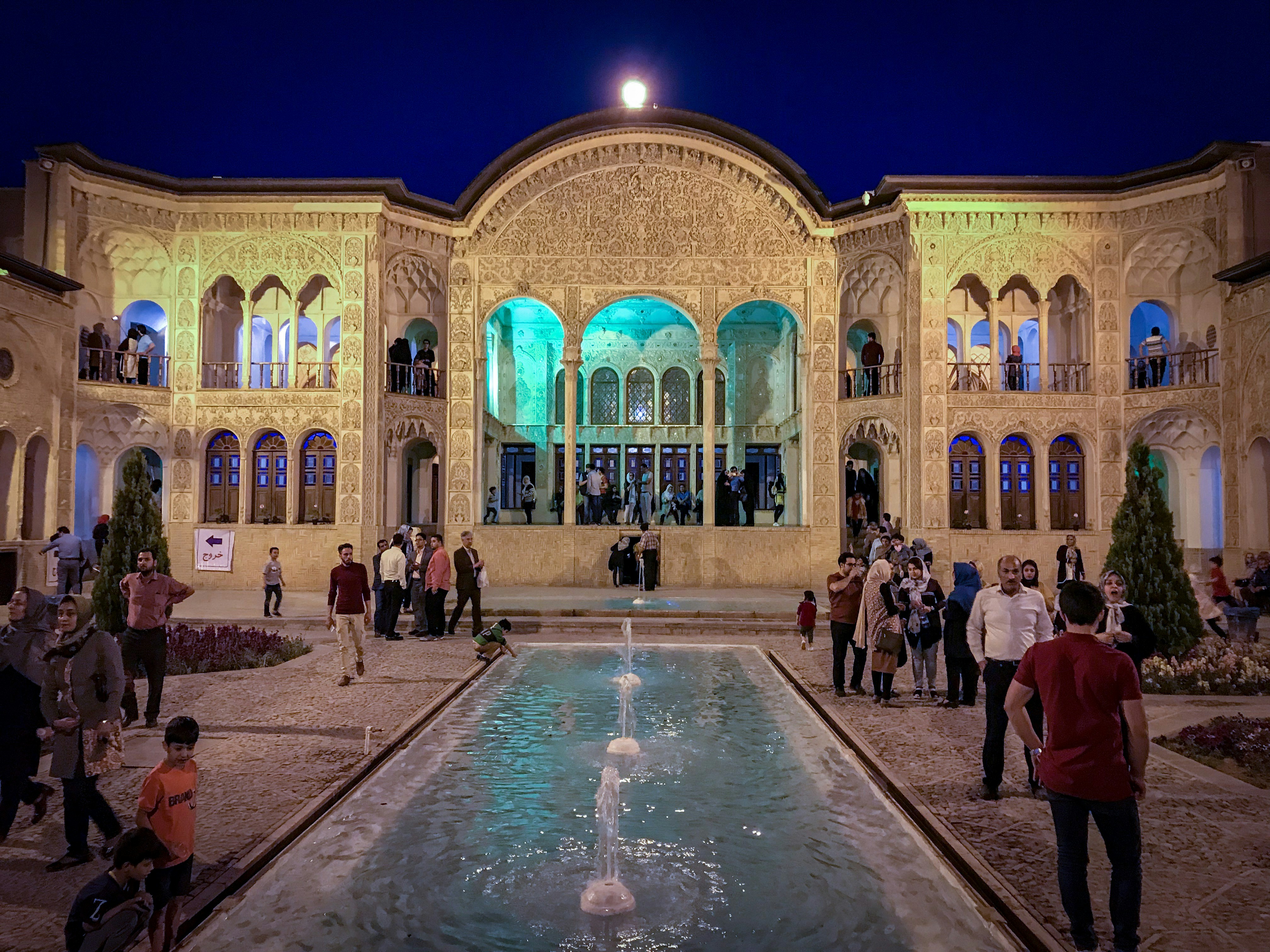 people near outdoor fountain