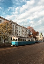 blue and white tram train