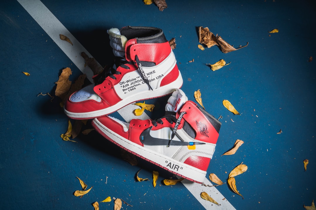 red-and-white Nike Air Jordan 1's