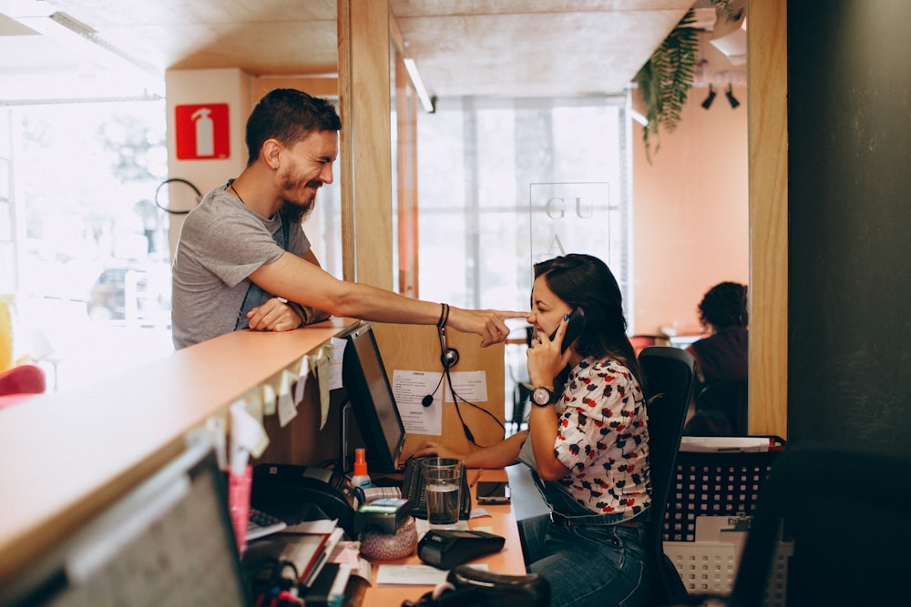 man and woman talking to each other