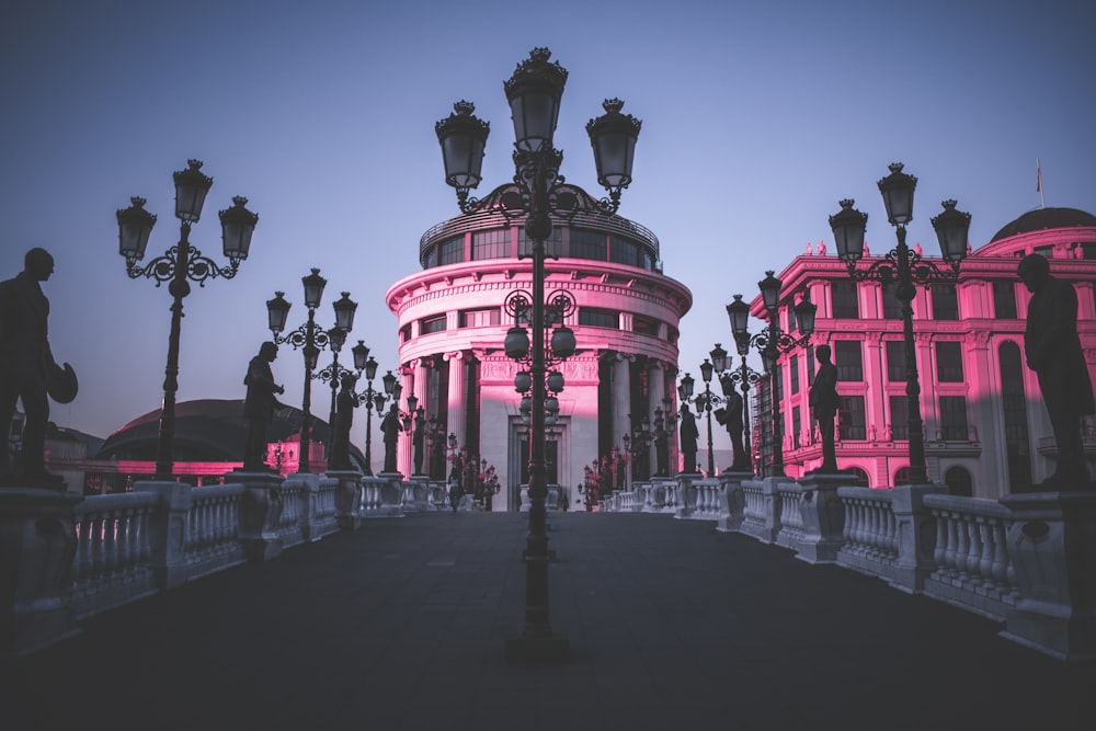 a row of street lamps sitting next to each other