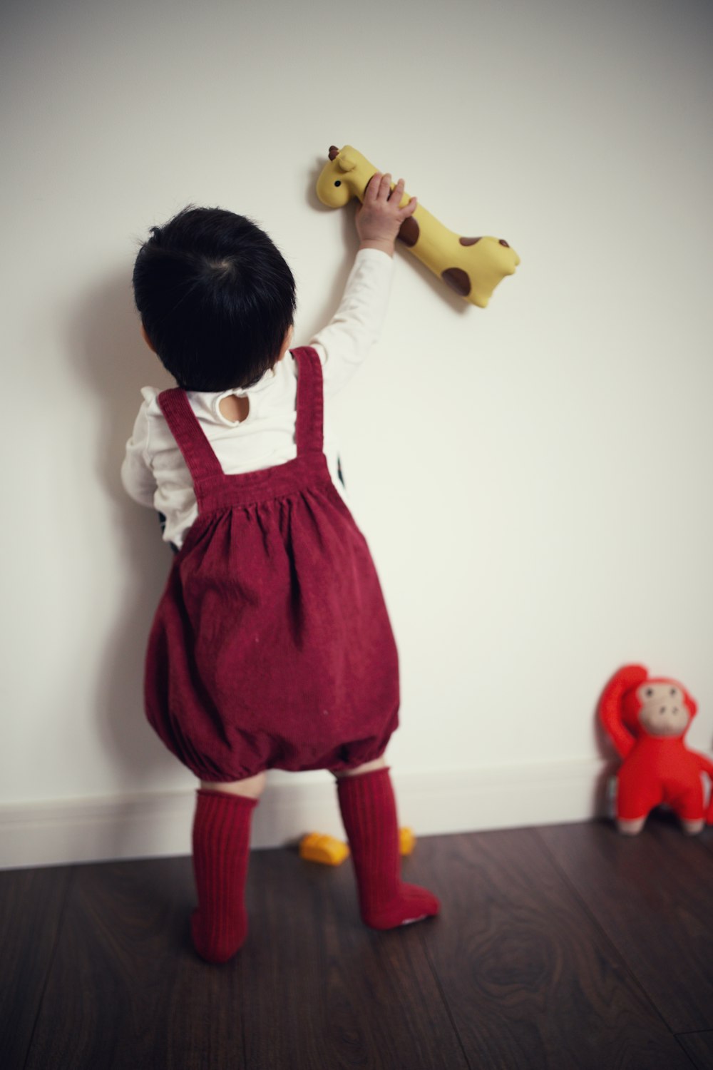 baby's red and white long-sleeved dress