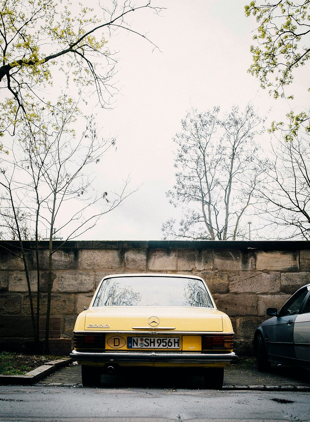 yellow Mercedes-Benz vehicle