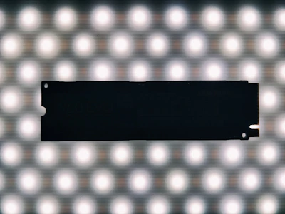 Sleek SSDs stacked with subtle orange highlights reflecting modern tech vibes.