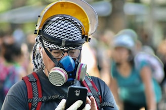 person with respirator on road