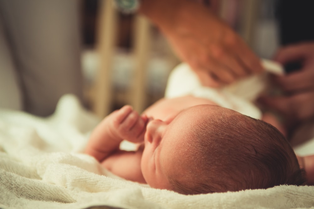 baby on bed