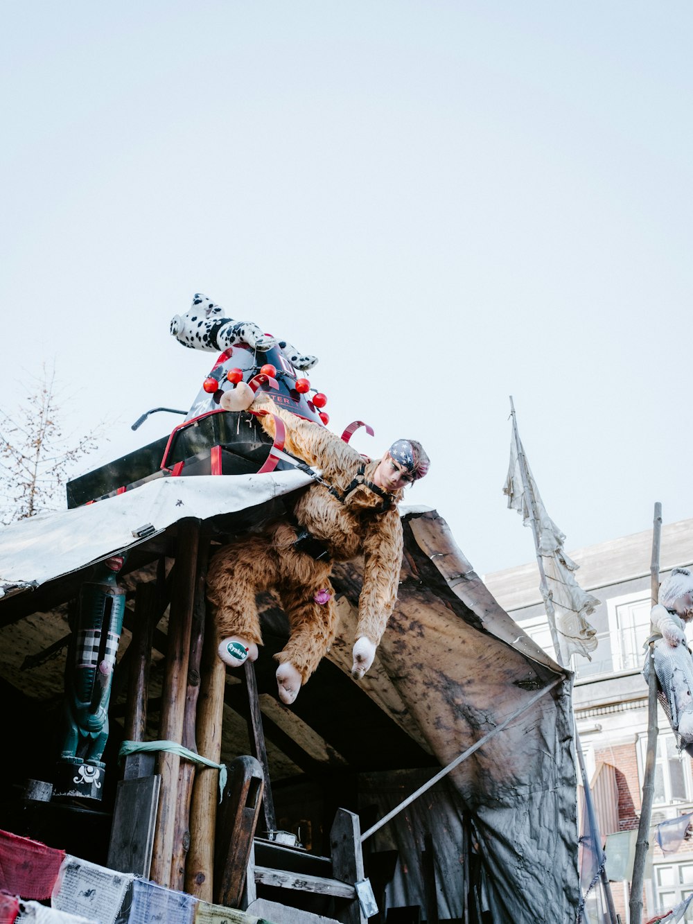 a man riding a snowboard on top of a wooden structure