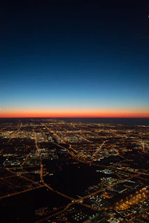 Still from a video edit showing a cinematic cityscape at dusk with glowing lights
