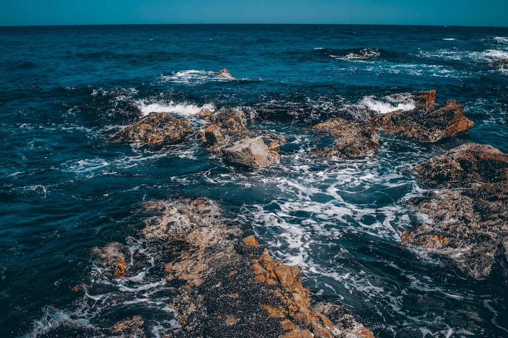 blue water and rock