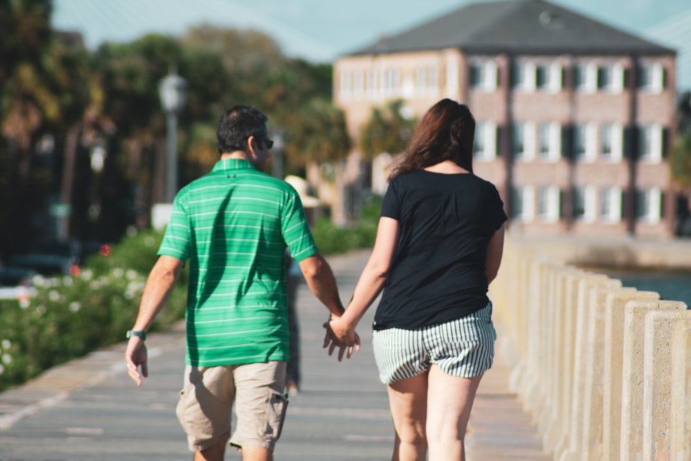 man wearing green stripe polo shirt