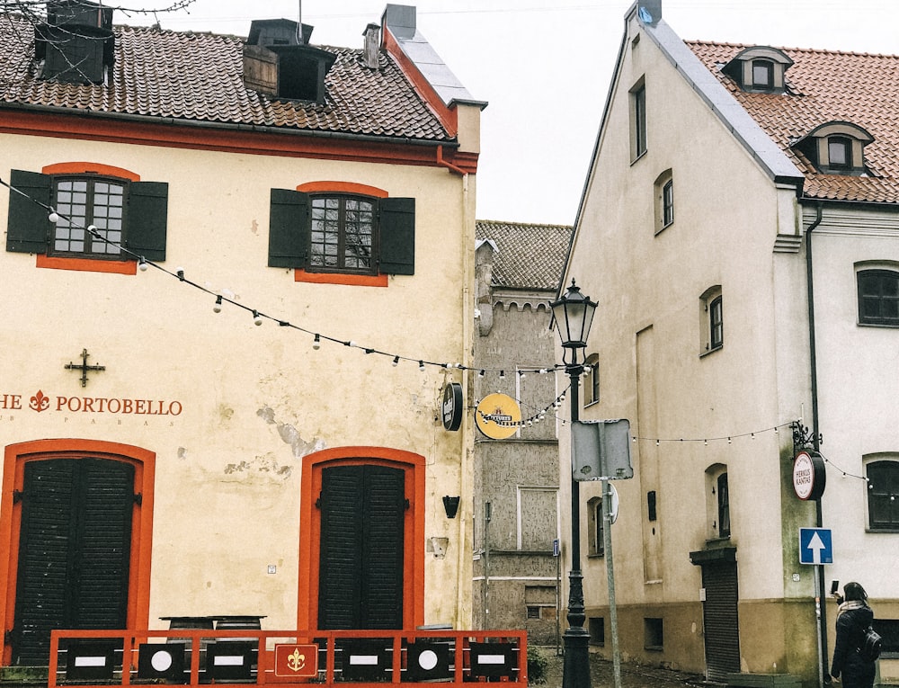 white 2-story house during daytime