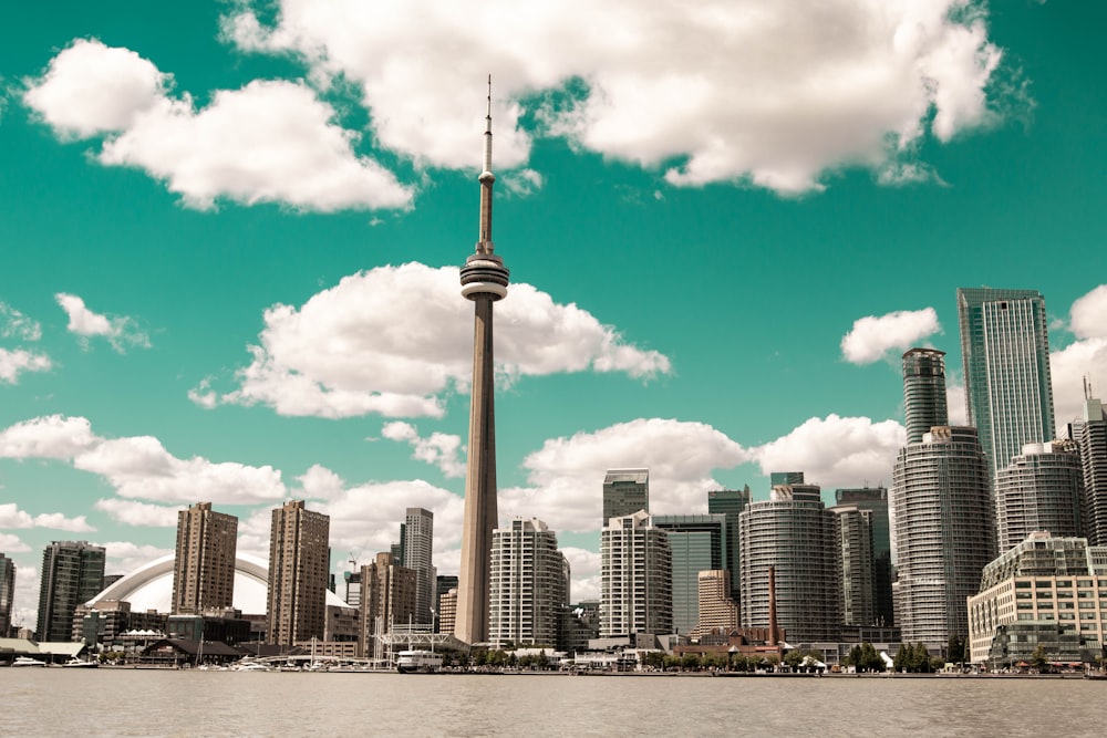 selective focus photography of buildings under cloudy sky during daytime