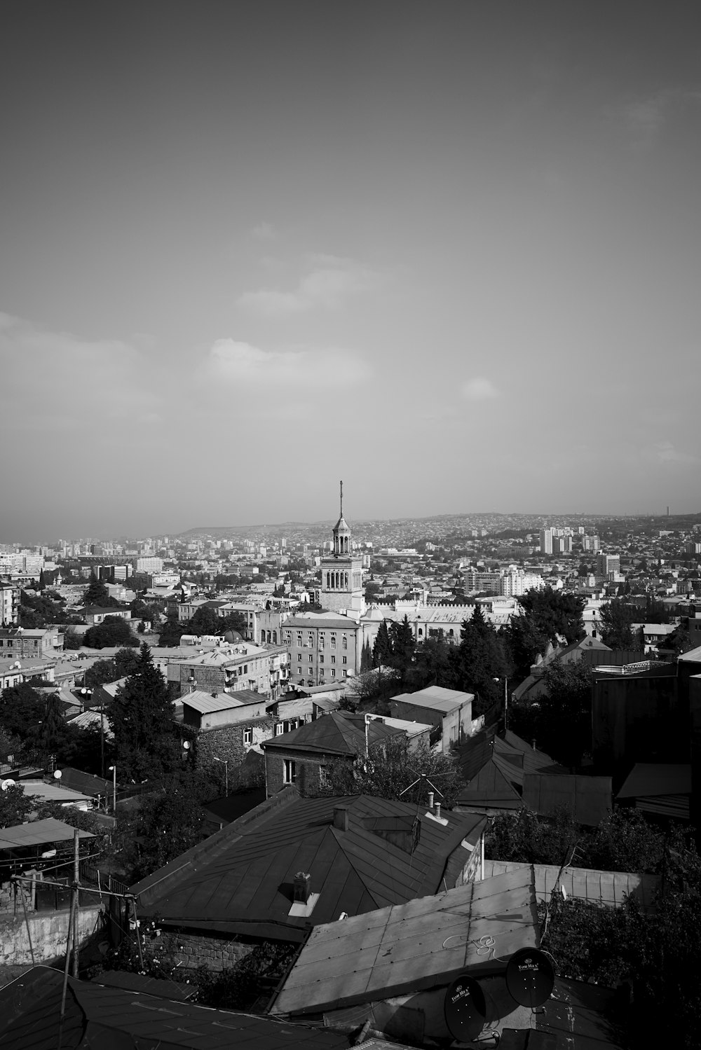 grayscale photography of concrete buildings