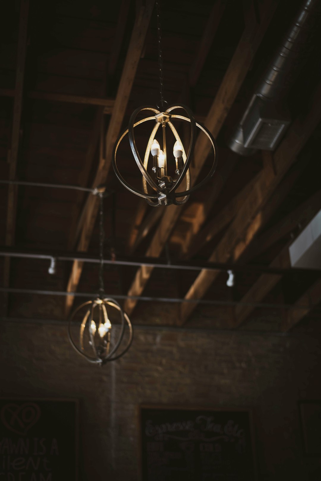 black pendant lamps turned on