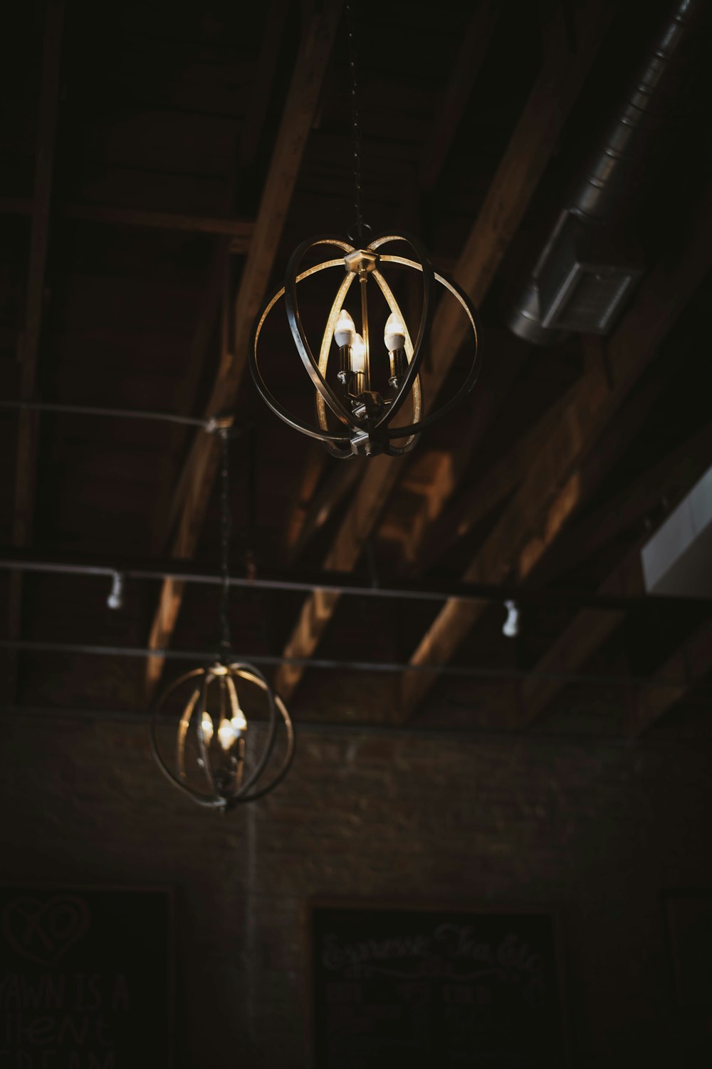 black pendant lamps turned on