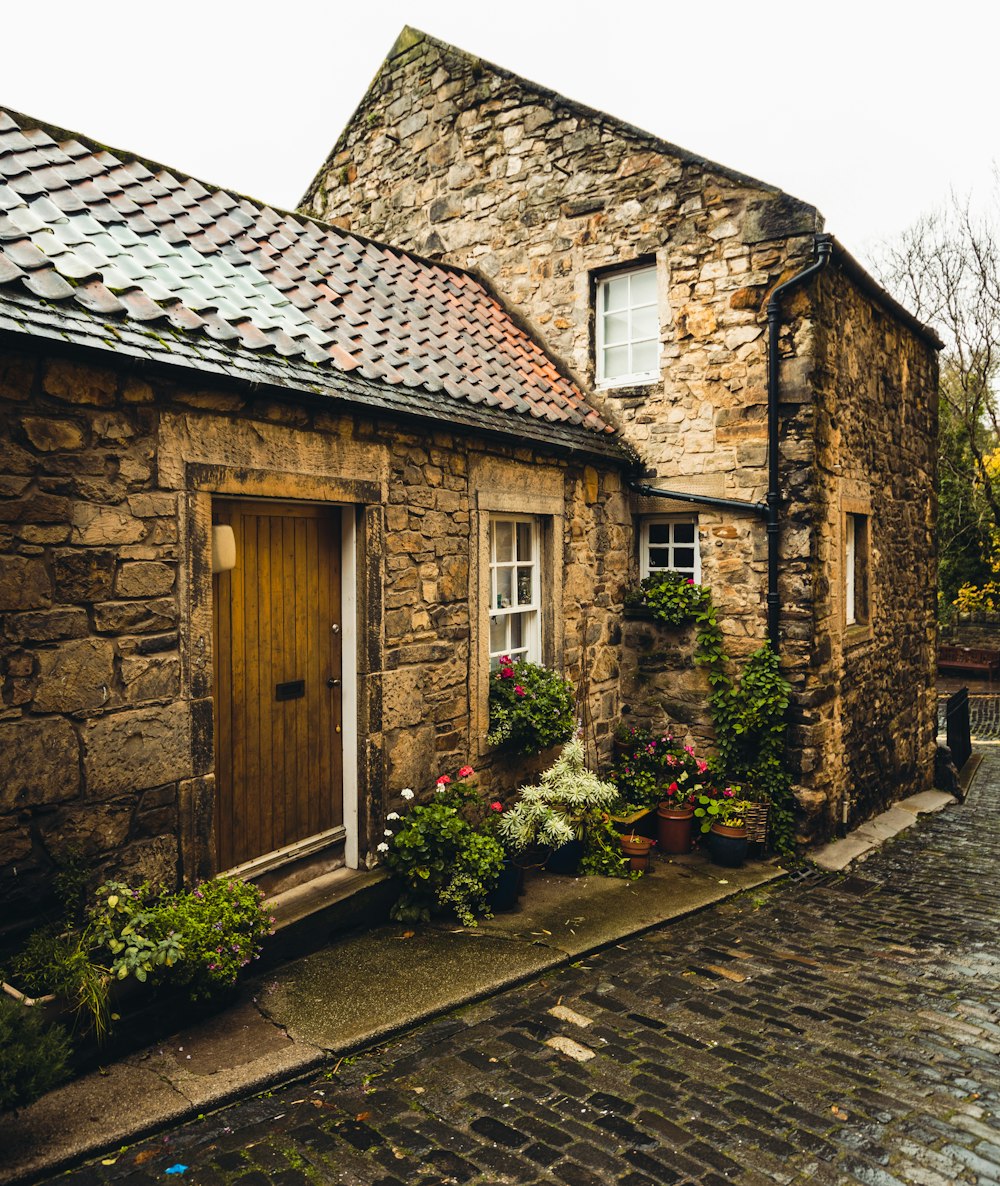 stone house with close door during daytime