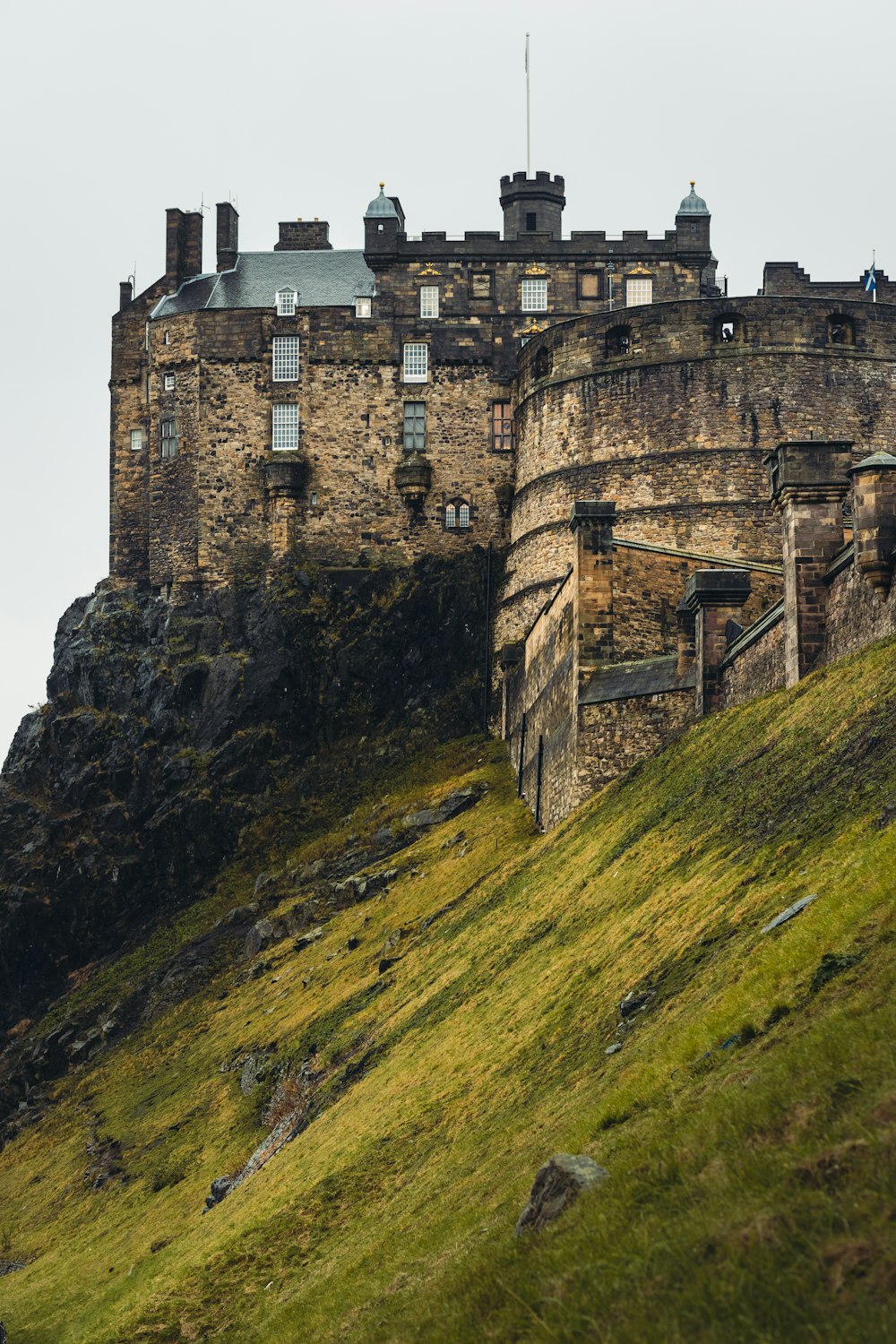 brown castle on top of hill