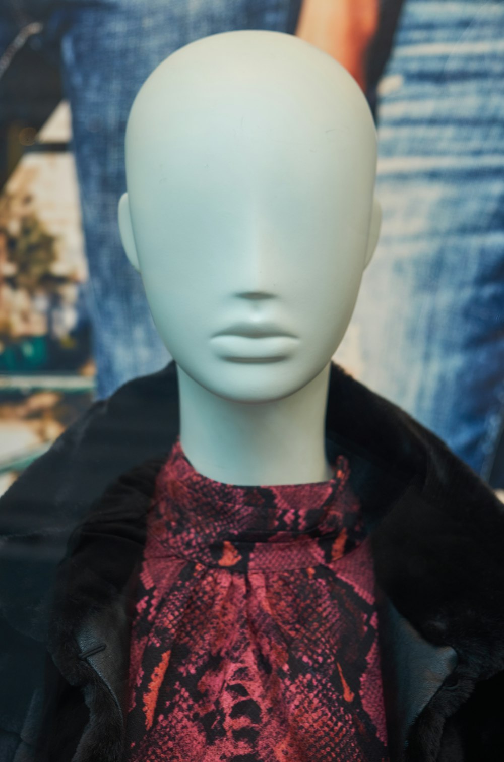 mannequin wearing black and red tops