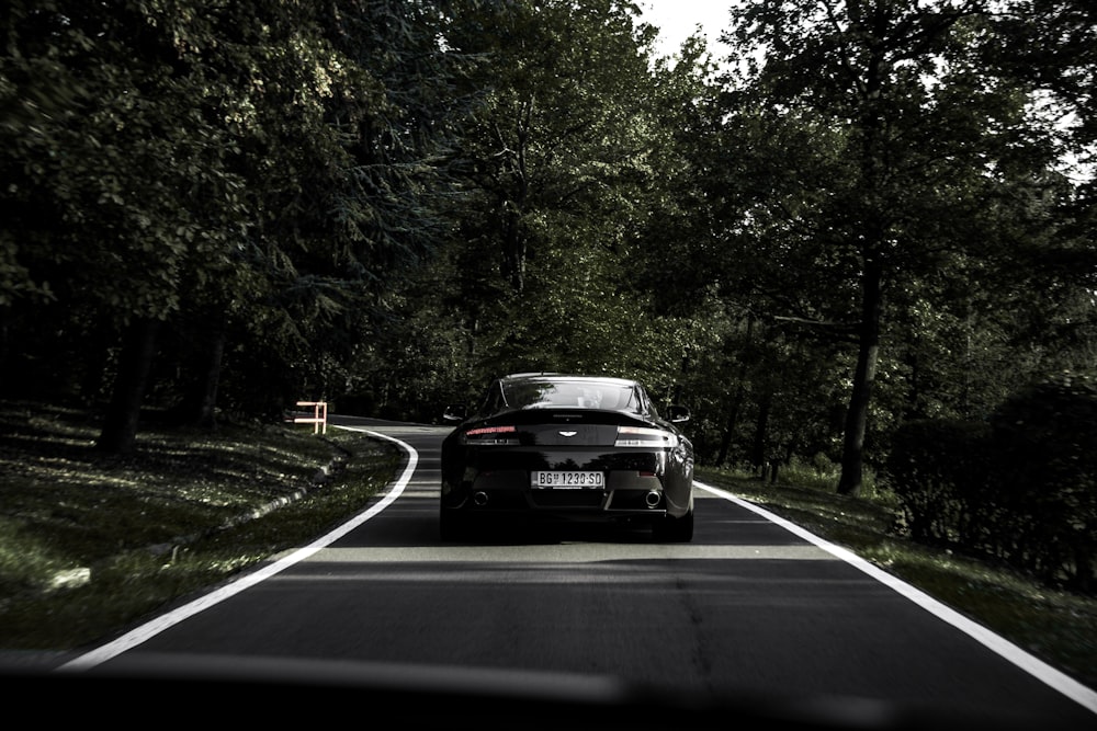 black coupe on road during daytime