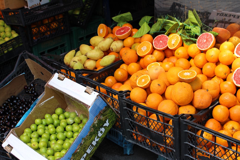 shallow focus photo of fruits in crates