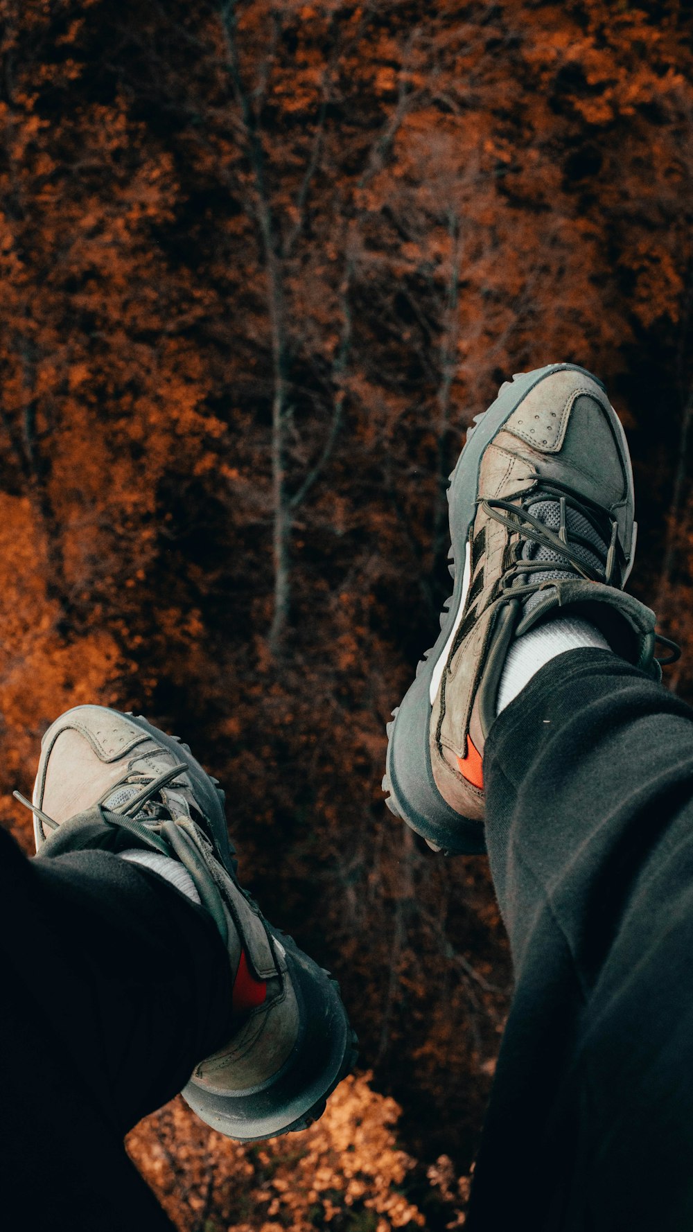 pair of grey running shoes