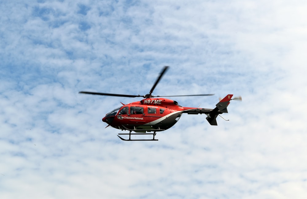 red and black helicopter photograph