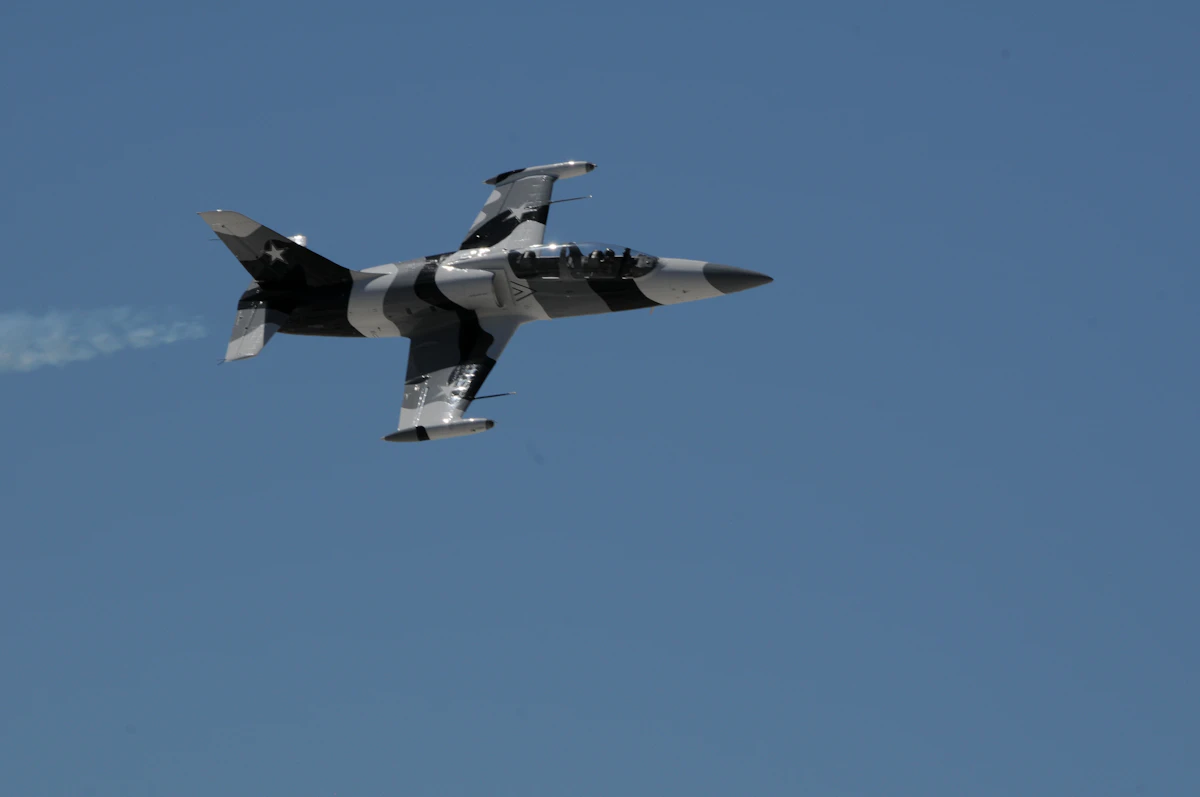 Jet aircraft flying through the sky