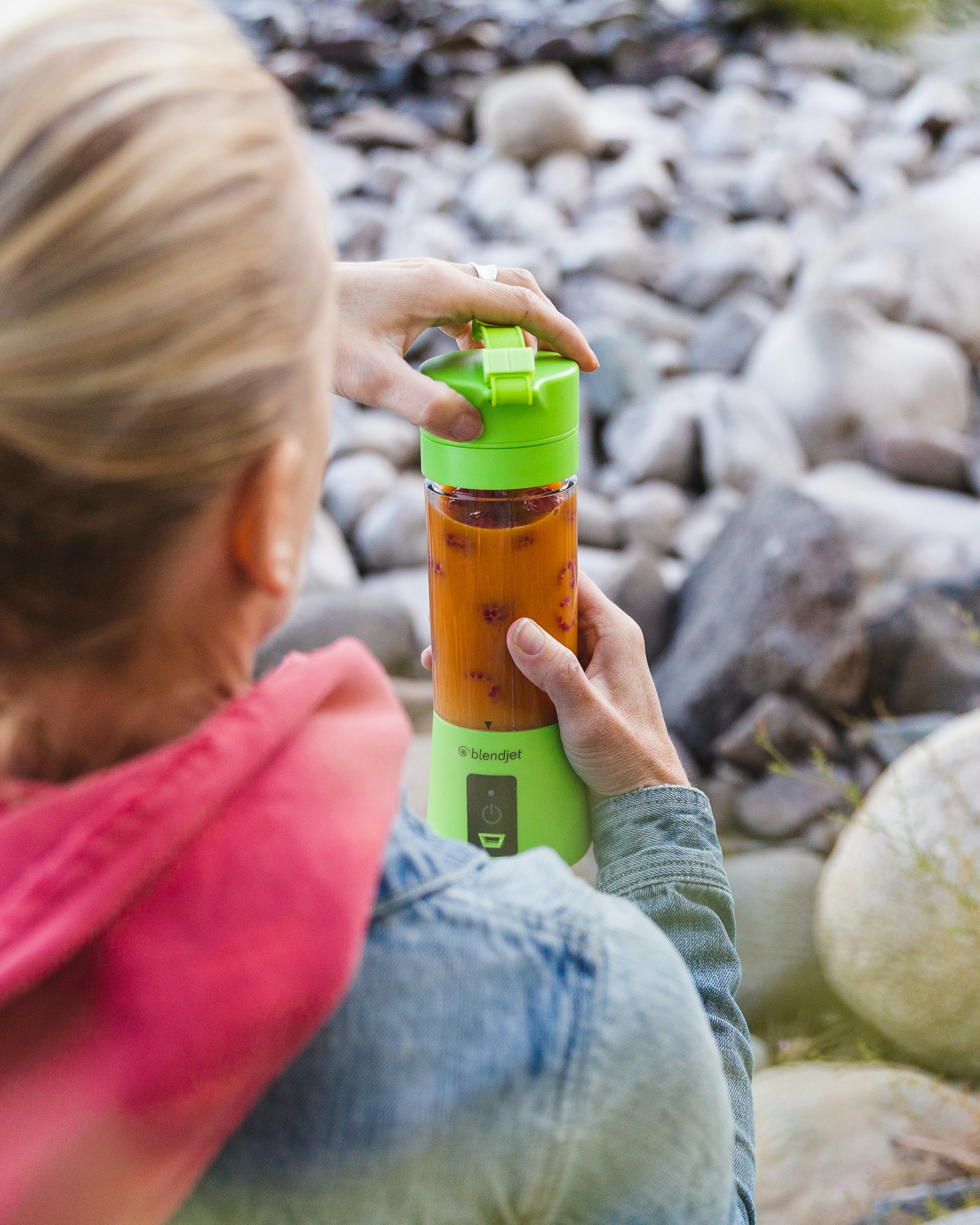 woman holding tumbler