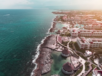 aerial view of hotels and resort facing ocean