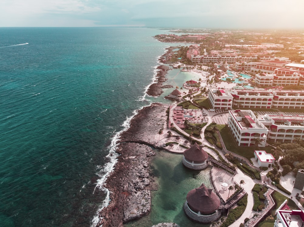 aerial view of hotels and resort facing ocean