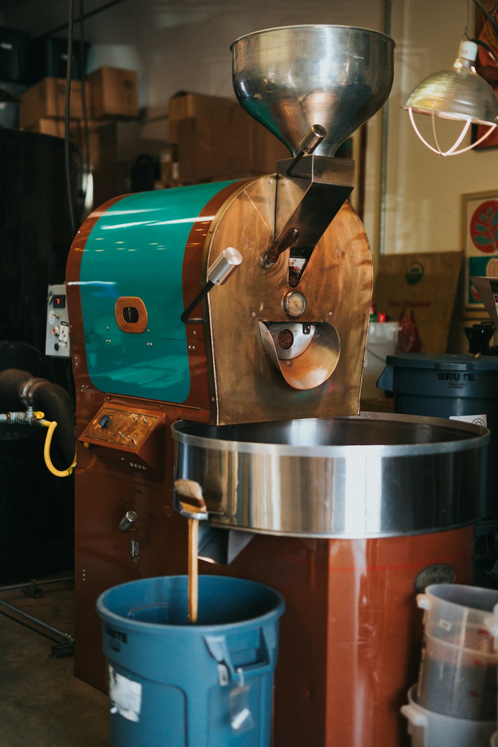 blue plastic pitcher near coffee maker