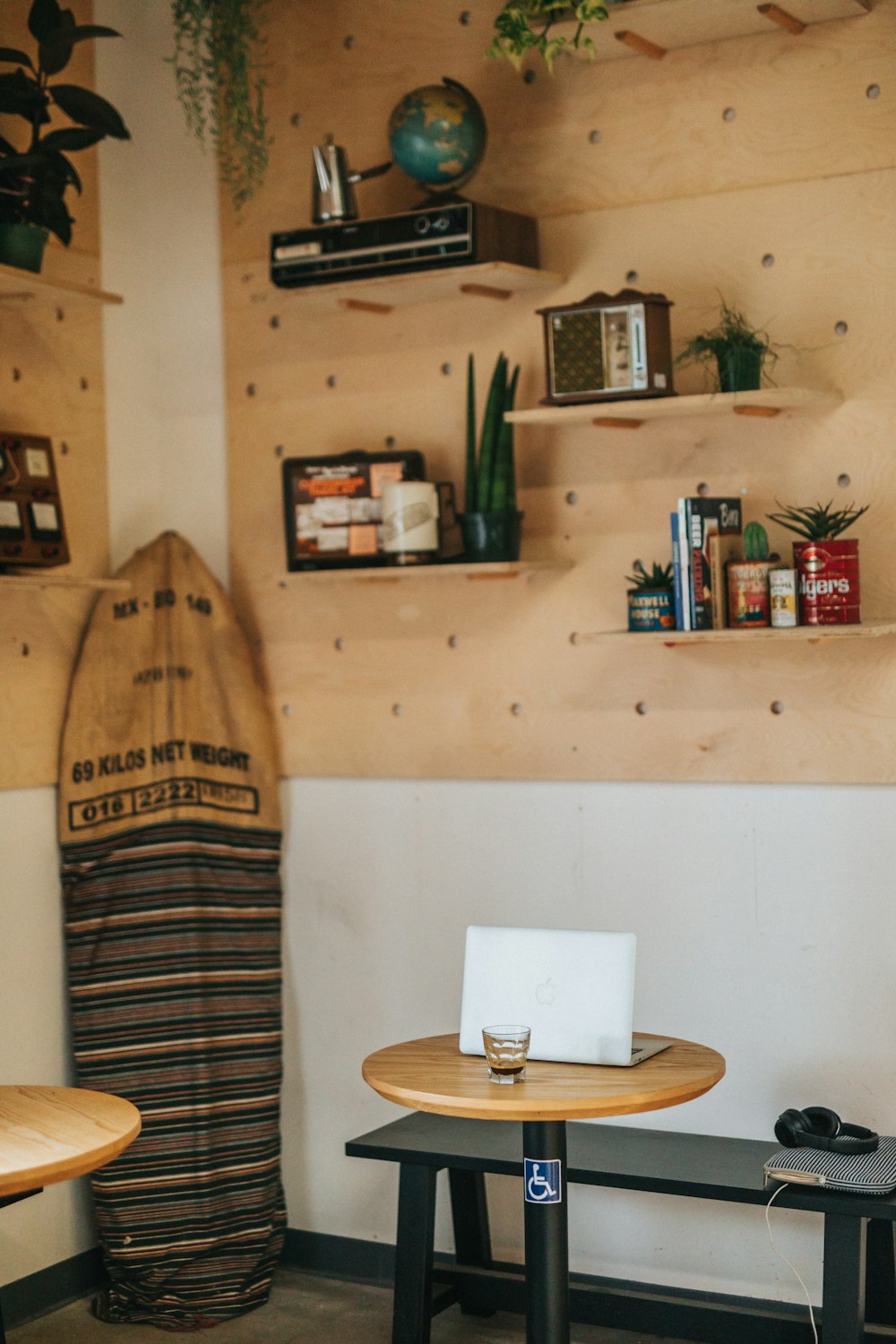 brown and gray-covered surfboard on corner