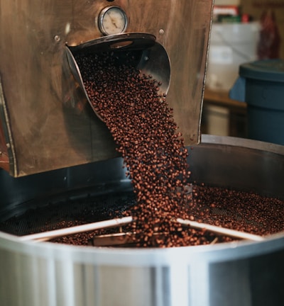 brown coffee beans on round container