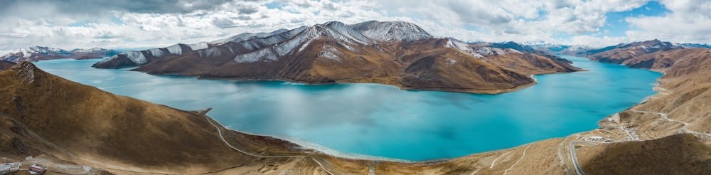 mountain surrounded with water