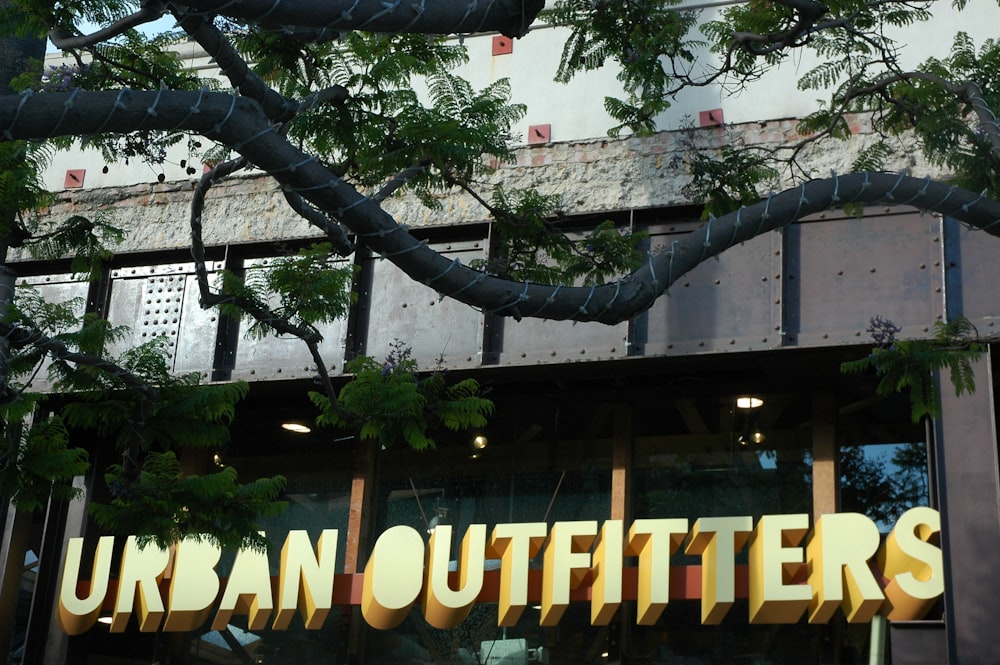 Urban Outfitters building near tree